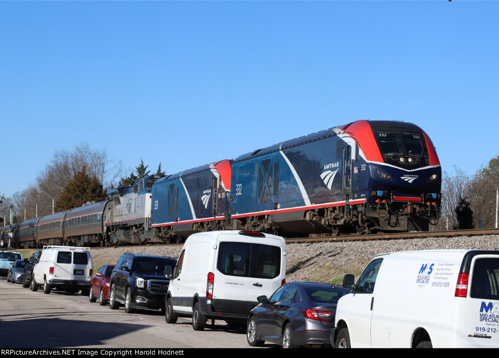 AMTK 332 leads train P092-31 away from the station